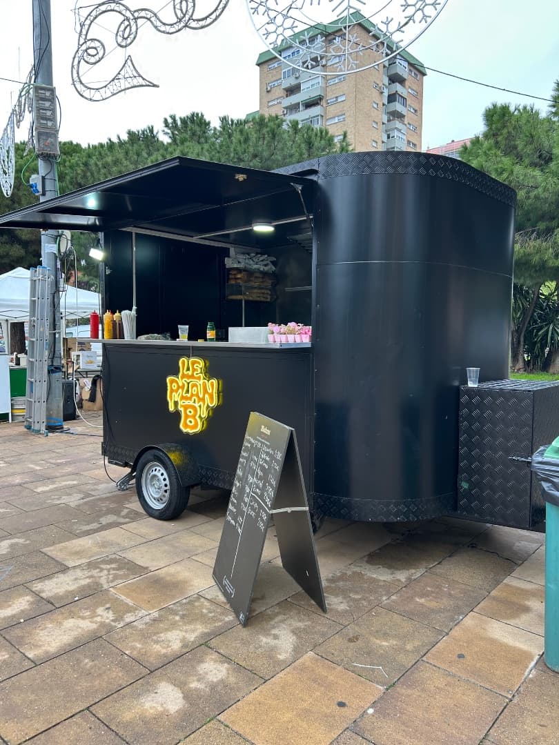 People Enjoying The Food Truck Delicious Food